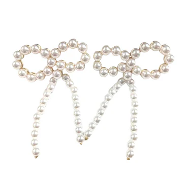BRIANNA CANNON PEARL BOW EARRINGS