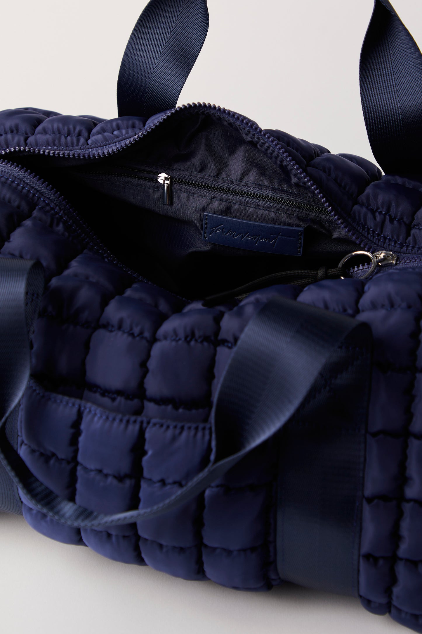 FREE PEOPLE NAVY BABY QUILTED DUFFLE