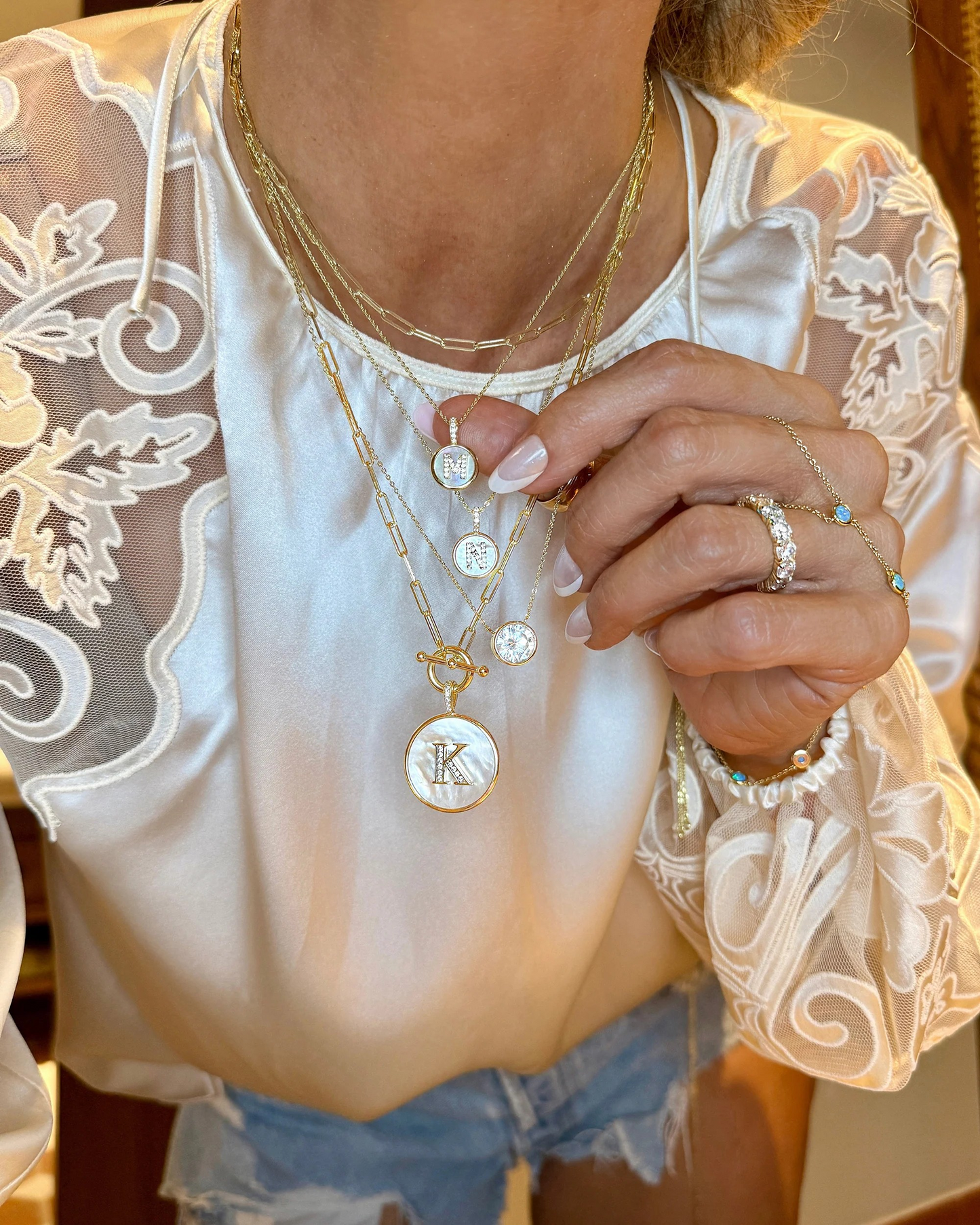 BABY LOVE LETTER MEDALLION NECKLACE